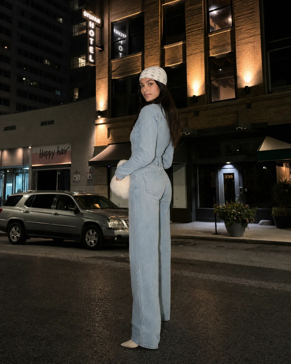 Fashion portrait on a city street at night